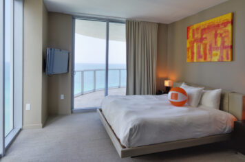 Miami, Florida, USA,Beach ball on bed in hotel room